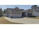 Charming single Gathering home showcasing a concrete drive and an attached garage at 3473 Plow Ground Rd, Johns Island, SC 29455