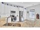 Well-lit kitchen featuring stainless steel appliances, granite countertops, and a tile backsplash at 3473 Plow Ground Rd, Johns Island, SC 29455