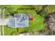 Aerial view of a home with a well-maintained roof, green backyard, and wooden privacy fence at 3545 Rookwood Pl, Johns Island, SC 29455
