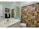 Cozy bathroom featuring a shower and tub combo, toilet, and vanity with a sink at 3545 Rookwood Pl, Johns Island, SC 29455