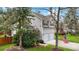 Two-story home with gray siding, a two-car garage, and well-manicured landscaping at 3545 Rookwood Pl, Johns Island, SC 29455