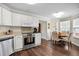Modern kitchen with stainless steel appliances and adjacent dining area with plenty of natural light at 3545 Rookwood Pl, Johns Island, SC 29455