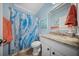 Bright bathroom featuring a vanity with marble top, tile floors, and blue accents at 362 Sanctuary Park Dr, Summerville, SC 29486