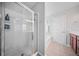 Bathroom features a glass enclosed shower, tile flooring, and soaking tub at 362 Sanctuary Park Dr, Summerville, SC 29486