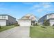 Charming two-story home features a two-car garage, well-manicured lawn, and inviting front porch at 362 Sanctuary Park Dr, Summerville, SC 29486