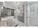 Elegant bathroom features a freestanding tub, glass shower, and stylish vanity at 4070 Egret Perch Ct, Ravenel, SC 29470