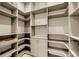 Walk-in closet with adjustable shelving and ample storage space at 4070 Egret Perch Ct, Ravenel, SC 29470