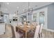 Open concept dining room and kitchen area with dining table and seating at 4070 Egret Perch Ct, Ravenel, SC 29470