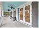 Inviting porch with a light blue ceiling and gray shutters, offering a relaxing outdoor space at 4070 Egret Perch Ct, Ravenel, SC 29470