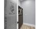 Interior wine cellar featuring ample wine storage and a frosted door at 4070 Egret Perch Ct, Ravenel, SC 29470