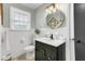 Updated bathroom features modern fixtures, a decorative mirror, and plenty of space at 4203 Marilyn Dr, North Charleston, SC 29418