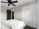 Neutral bedroom with a ceiling fan, closet and ensuite access at 4203 Marilyn Dr, North Charleston, SC 29418