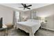 Neutral bedroom featuring a ceiling fan and a comfortable-looking bed and side tables at 4203 Marilyn Dr, North Charleston, SC 29418