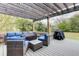 Backyard deck and pergola area with lots of seating at 4203 Marilyn Dr, North Charleston, SC 29418