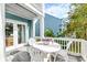 Relaxing outdoor balcony with seating, perfect for enjoying the fresh air and views at 482 Sea Cloud Cir, Edisto Island, SC 29438