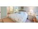 This coastal bedroom features wicker furniture and bright, natural lighting at 482 Sea Cloud Cir, Edisto Island, SC 29438