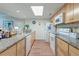 Well-lit kitchen featuring granite countertops and modern white appliances at 482 Sea Cloud Cir, Edisto Island, SC 29438