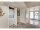 Stacked washer and dryer off of finished basement entryway at 482 Sea Cloud Cir, Edisto Island, SC 29438