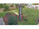 View of a well-maintained backyard with mature trees, providing a serene and private outdoor space at 502 W Ashley Ave, Folly Beach, SC 29439
