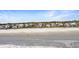 Beach homes lined up along the coast featuring the ocean with people enjoying the beach at 502 W Ashley Ave, Folly Beach, SC 29439
