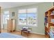 Bedroom with large windows providing natural light and views of the outdoors at 502 W Ashley Ave, Folly Beach, SC 29439