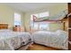 Bedroom with multiple beds including a bunk bed at 502 W Ashley Ave, Folly Beach, SC 29439