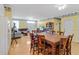 Spacious dining and living room area with hardwood floors and great natural light at 502 W Ashley Ave, Folly Beach, SC 29439