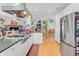Kitchen featuring stainless steel appliances and an island with a cooktop at 502 W Ashley Ave, Folly Beach, SC 29439