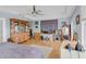 Spacious main bedroom with wood floors, walk-in closet, built-in features, and natural light at 502 W Ashley Ave, Folly Beach, SC 29439