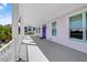 Inviting porch with a covered walkway offers a glimpse of the neighborhood at 502 W Ashley Ave, Folly Beach, SC 29439