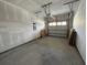 Unfinished garage featuring concrete floors and plenty of space for storage at 5126 Double Eagle, Summerville, SC 29485