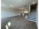 Open concept living room flows into a chef's kitchen and staircase at 5126 Double Eagle, Summerville, SC 29485