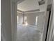 Sunlit bedroom featuring smooth walls, trim, and modern lighting fixtures create a cozy and inviting space at 6201 Drayton St, Ravenel, SC 29470
