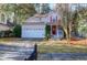 Well-maintained two-story home with a manicured front yard, two car garage and welcoming curb appeal at 635 Fair Spring Dr, Charleston, SC 29414