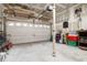 Spacious garage with ample storage and overhead shelving, ready for your projects and vehicles at 635 Fair Spring Dr, Charleston, SC 29414
