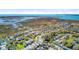 Expansive aerial view showcasing homes nestled among coastal marshlands and the intercoastal waterways at 744 Gate Post Dr, Mount Pleasant, SC 29464
