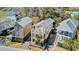 Charming houses feature a balcony view amid lush green landscaping and private driveways at 744 Gate Post Dr, Mount Pleasant, SC 29464