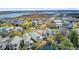 Expansive aerial view showcasing beautiful homes nestled among ponds and coastal marshlands at 744 Gate Post Dr, Mount Pleasant, SC 29464