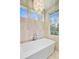 Beautiful bathroom featuring a large soaking tub under stylish pendant lighting at 744 Gate Post Dr, Mount Pleasant, SC 29464