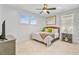 Comfortable bedroom with neutral tones, a ceiling fan, and ample natural light at 744 Gate Post Dr, Mount Pleasant, SC 29464