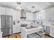 Modern white kitchen featuring stainless appliances and marble countertops at 744 Gate Post Dr, Mount Pleasant, SC 29464