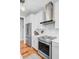 Kitchen featuring stainless steel appliances, white cabinetry, and a tile backsplash at 744 Gate Post Dr, Mount Pleasant, SC 29464