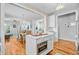Kitchen island with a microwave opens to the living and dining area at 744 Gate Post Dr, Mount Pleasant, SC 29464