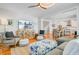 Open-concept living room flows into the dining area and kitchen at 744 Gate Post Dr, Mount Pleasant, SC 29464