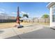 Expansive backyard with a concrete patio area, ideal for outdoor dining and entertaining, surrounded by a wooden fence at 7649 Fayetteville Rd, North Charleston, SC 29418