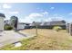 Large, fenced backyard featuring a concrete patio, offering ample space for outdoor activities and relaxation at 7649 Fayetteville Rd, North Charleston, SC 29418