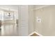 View of laundry room area with shelving and tile floor at 7649 Fayetteville Rd, North Charleston, SC 29418