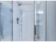 Shower stall with glass doors and shower head featuring silver hardware at 7720 Kinston St, North Charleston, SC 29418