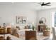 Bright living room featuring neutral paint, modern decor, and a stylish ceiling fan at 830 Alma Square Dr, Moncks Corner, SC 29461