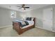 Comfortable bedroom featuring a ceiling fan, a window, and neutral walls at 8704 Middleton Point Ln, Edisto Island, SC 29438